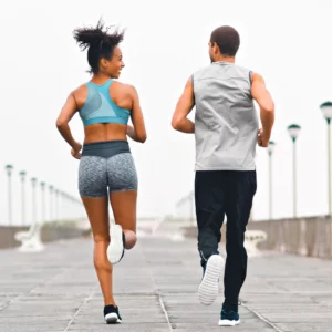 active couple running outdoors